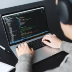 A website developer coding